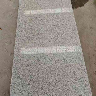 西宁芝麻白光面毛板